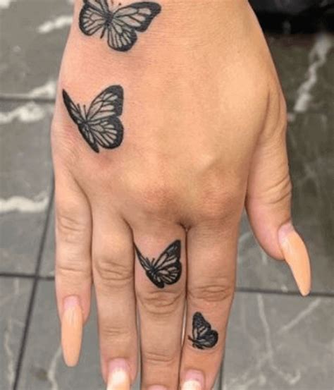 butterfly tattoo on hand|55 Butterfly Hand Tattoo Ideas That Soar